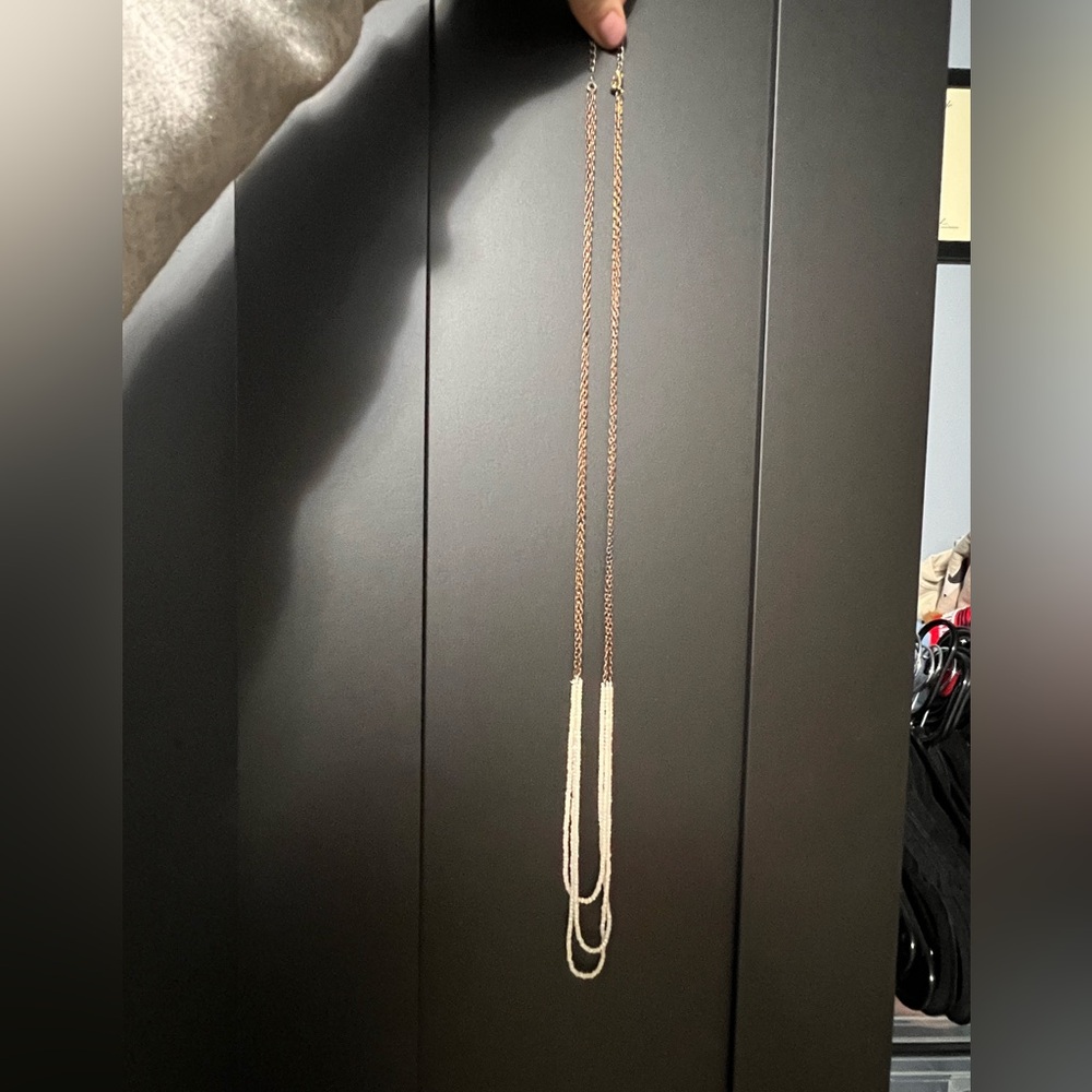 Elegant Gold and White Necklace